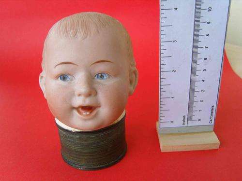Vintage Bisque Dolls Head -Ready to use - Has a hairline crack - Not visible to  Eye.