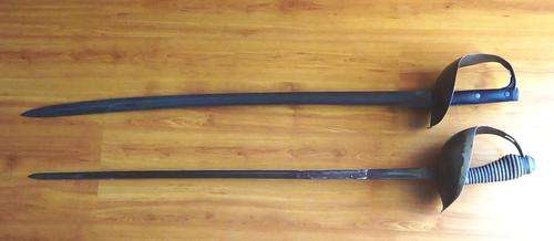 Two Damaged British Swords