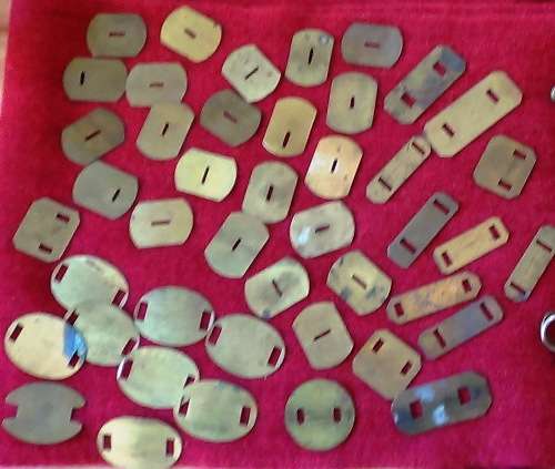 Large assortment of Brass Backing plates,  pins etc WW2 and later