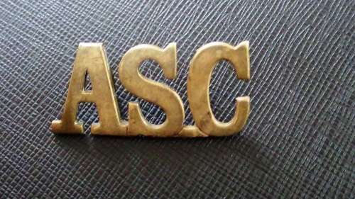 British Army Service Corps Brass Shoulder Title. Large. 1st World War .Lugs intact