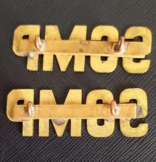 Pair of large brass shoulder titles possibly Shamva Gold Mine Police in Moshonaland