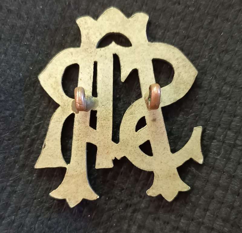 Early white metal South African Railways Slouch Hat Badge