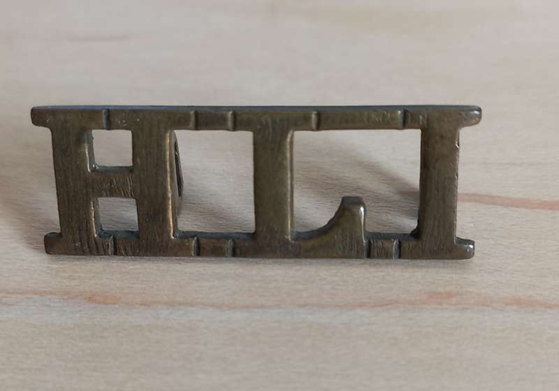 Highland Light Infantry World war  1 Brass Shoulder Title