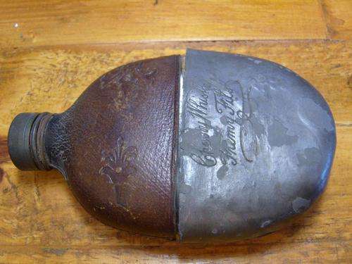 Antique leather and pewter flask