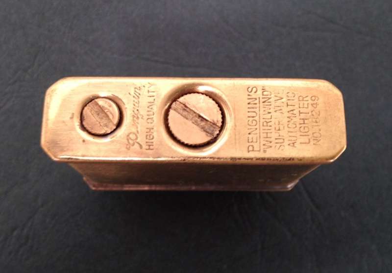 Vintage brass Penguin "Whirlwind" Lighter commemorating The Duryea - America's First, 1896.