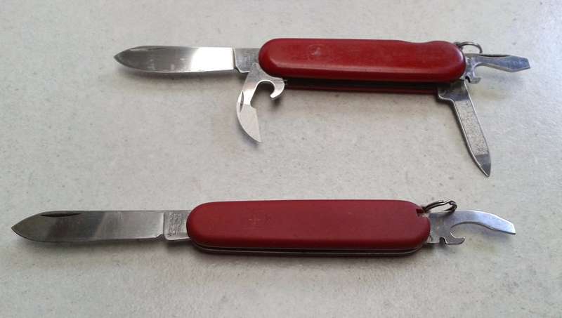 Pocket knife lot : Two Swiss Army pocket knives, Wenger Commander & Victorinox Bantam