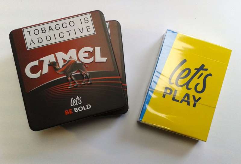 Camel cigarette tins and sealed playing cards (promotional items)