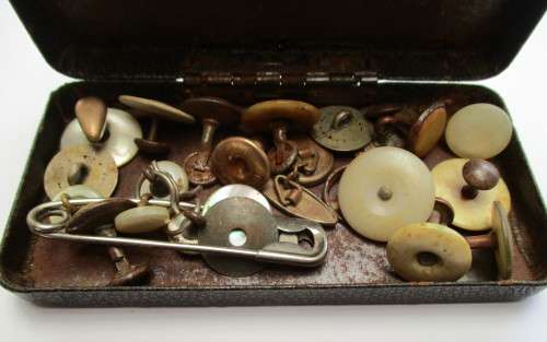 A box of vintage buttons etc.