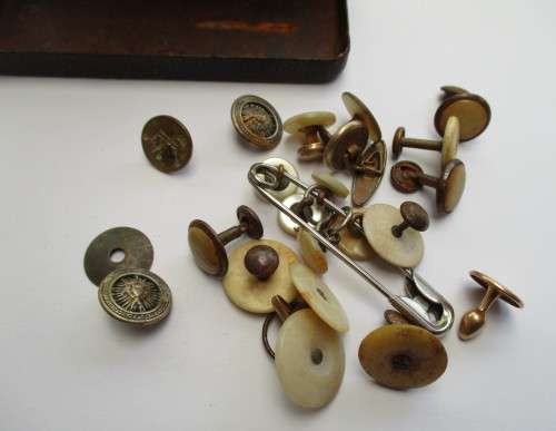 A box of vintage buttons etc.