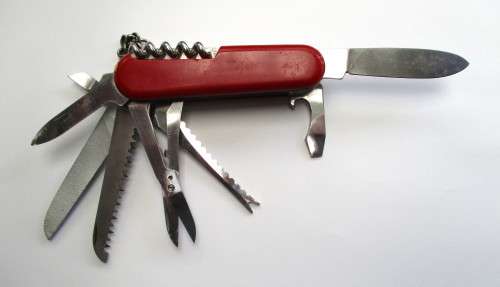 Discontinued six layer Wenger Delemont pocket knife with old can opener, unknown model. ??
