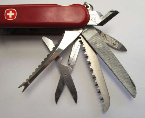 Discontinued six layer Wenger Delemont pocket knife with old can opener, unknown model. ??