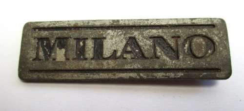 Lot -- Automobile / Car related items - Volvo badge / Milano badge / feeler guages and key chains.