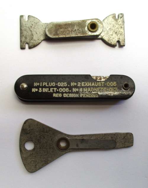 Lot -- Automobile / Car related items - Volvo badge / Milano badge / feeler guages and key chains.
