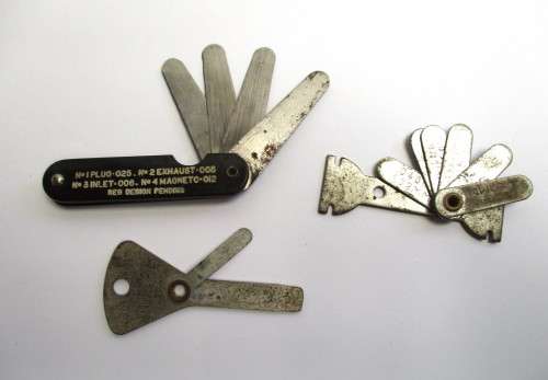 Lot -- Automobile / Car related items - Volvo badge / Milano badge / feeler guages and key chains.