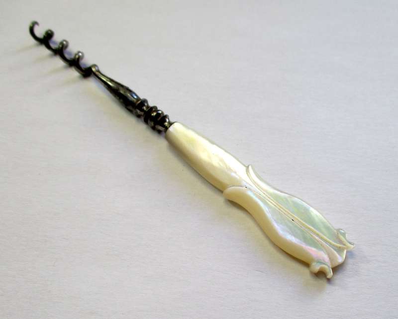 Antique, Victorian ? hand carved, mother of pearl, perfume bottle cork screw.