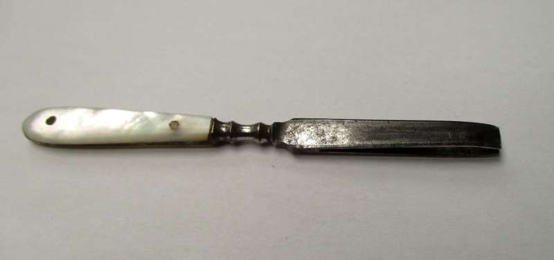 Antique, mother of pearl handled tweezers.