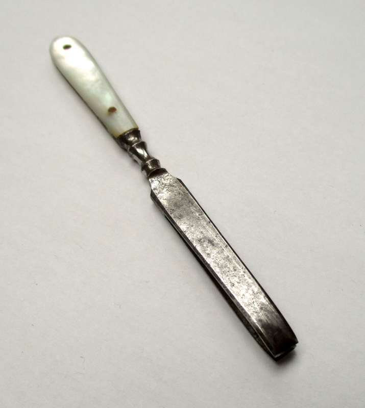 Antique, mother of pearl handled tweezers.