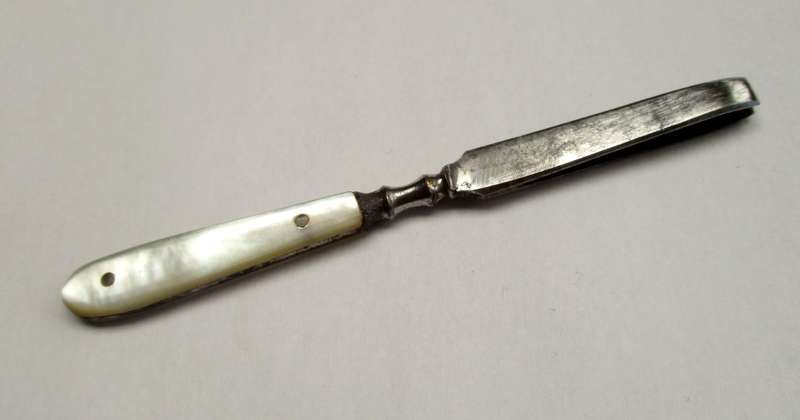 Antique, mother of pearl handled tweezers.