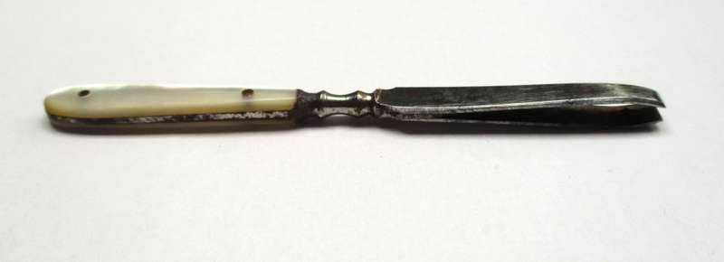 Antique, mother of pearl handled tweezers.