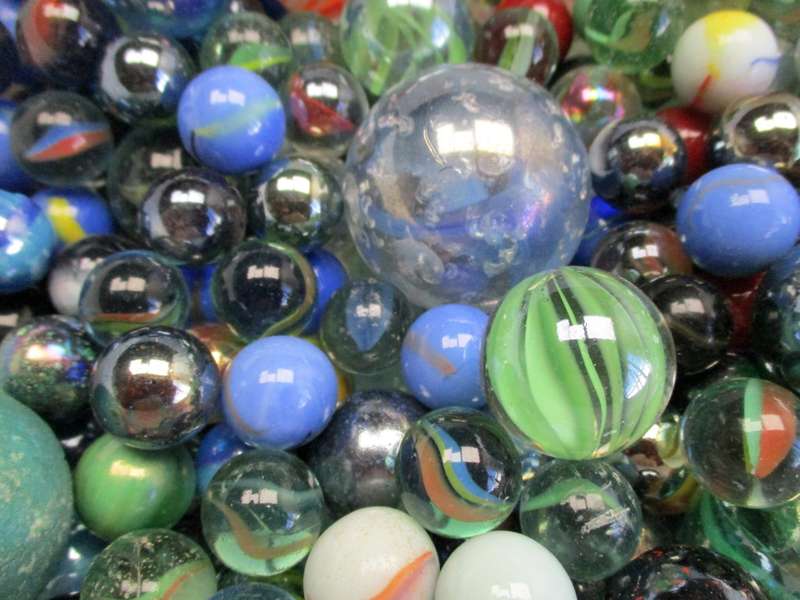 Marble lot - one ice-cream tub of various marbles
