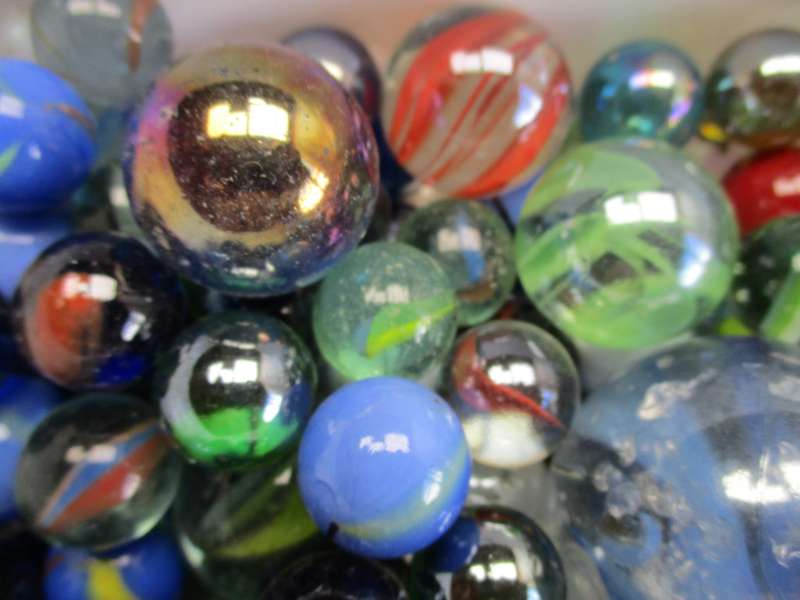 Marble lot - one ice-cream tub of various marbles