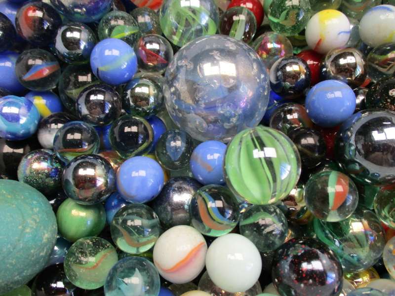 Marble lot - one ice-cream tub of various marbles