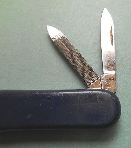 A small Victorinox Pocket knife, Black with SAA Logo.