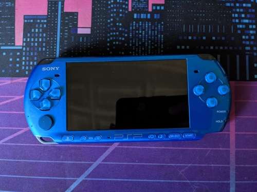 Blue PSP 3000 / Slim with 4GB Memory card and one game