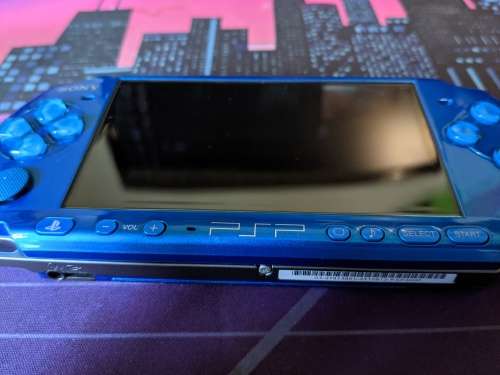 Blue PSP 3000 / Slim with 4GB Memory card and one game