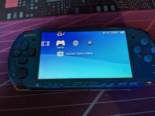 Blue PSP 3000 / Slim with 4GB Memory card and one game