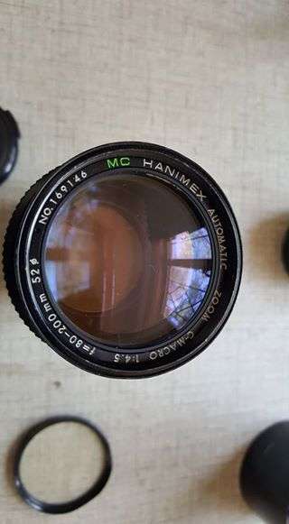 Vintage Minolta XE-1 35mm SLR with five lenses