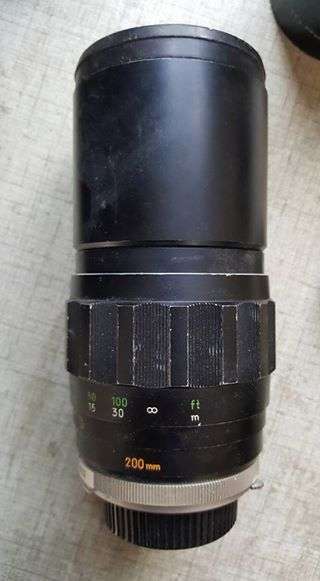 Vintage Minolta XE-1 35mm SLR with five lenses