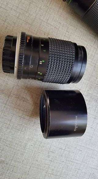 Vintage Minolta XE-1 35mm SLR with five lenses