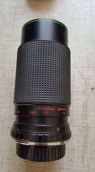 Vintage Minolta XE-1 35mm SLR with five lenses