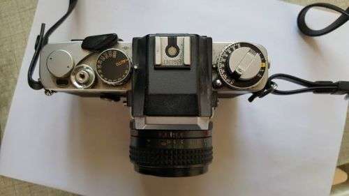 Vintage Minolta XE-1 35mm SLR with five lenses