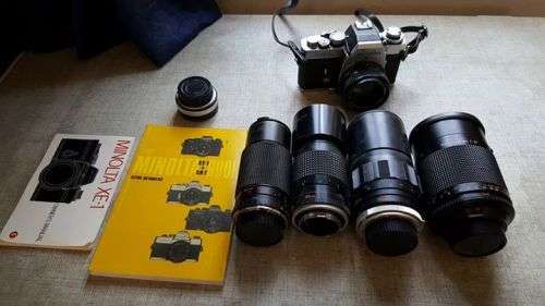 Vintage Minolta XE-1 35mm SLR with five lenses