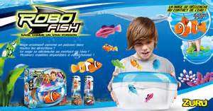 ROBO FISH, NEW DESIGNS!!! newest craze!!! swims in water ***great too fill Christmas stockings***