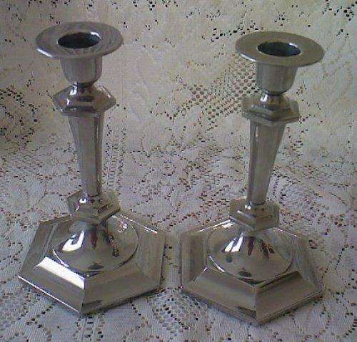MATCHING PAIR OF SILVER PLATED CANDLESTICKS