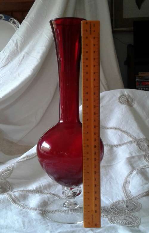 vintage ruby red vase with clear foot venetian?