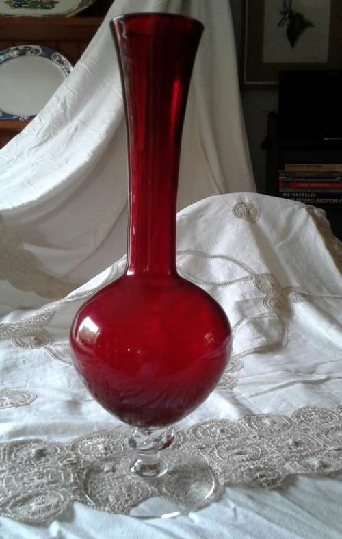 vintage ruby red vase with clear foot venetian?