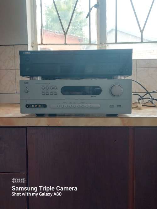 NAD T744 Amplifier and Yamaha CDC-585 5-Disc player in great condition. Amp needs attention