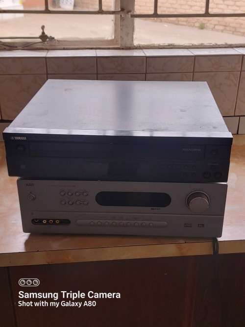 NAD T744 Amplifier and Yamaha CDC-585 5-Disc player in great condition. Amp needs attention