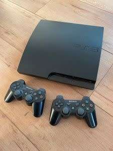 Sony PlayStation 3 slimline 320gb with 2 controllers