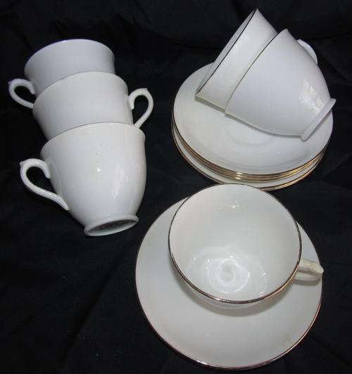 PHOENIX BONE CHINA TEA CUPS AND SAUCERS