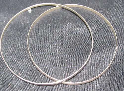PAIR OF STERLING SILVER BANGLES