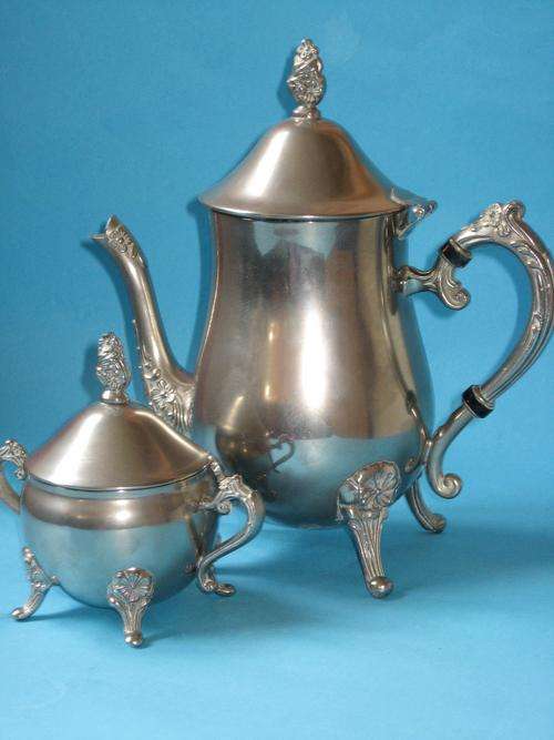 SILVER PLATED TEA POT AND SUGAR BOWL