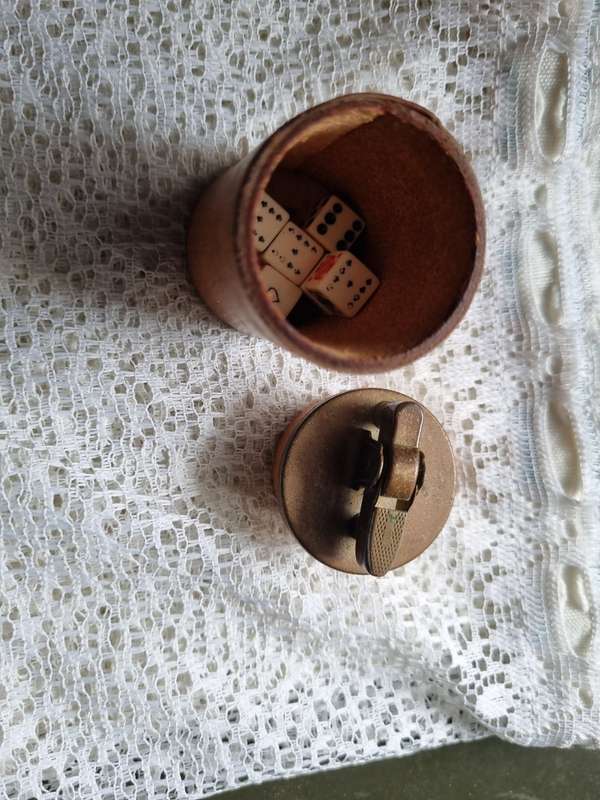 Collectable zippo and dice game in one