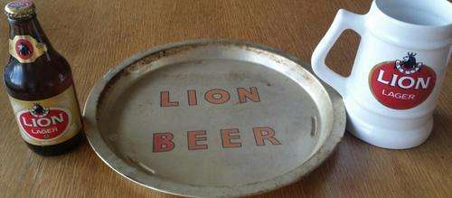1x LION TRAY 1X LION BEER- STILL FULL 1X LION MUG WITH SPRINGBOK EMBLEM