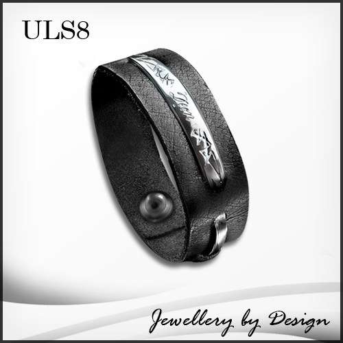 Wide Leather strap with a Spiked designed stainless steel plate ontop