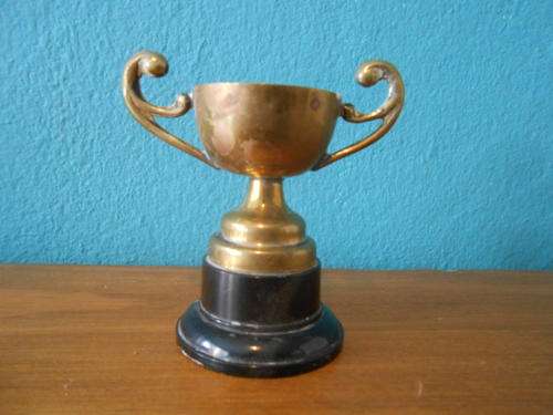 Small Vintage Gold Coloured Trophy (Stands 6 1/2 cm tall)